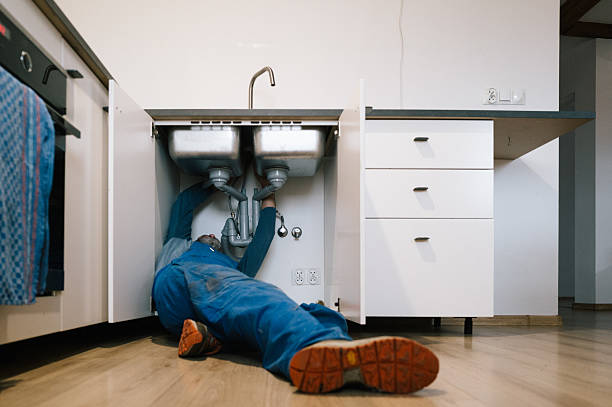 Professional Drain Cleaning technician working in Neenah, WI